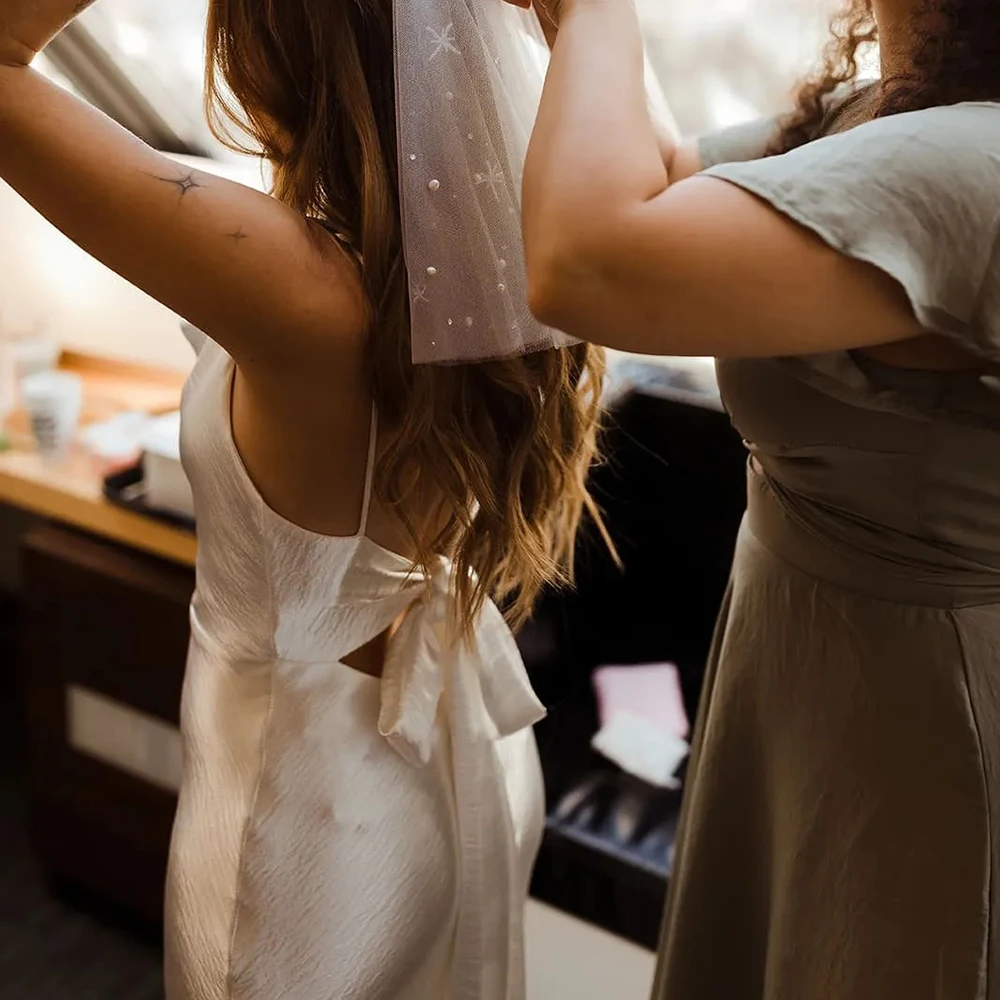 Robe de mariée évasée à volants et col bénitier, tenue de mariage à bretelles Spaghetti, dos nu avec cravate en ruban, coupe basse