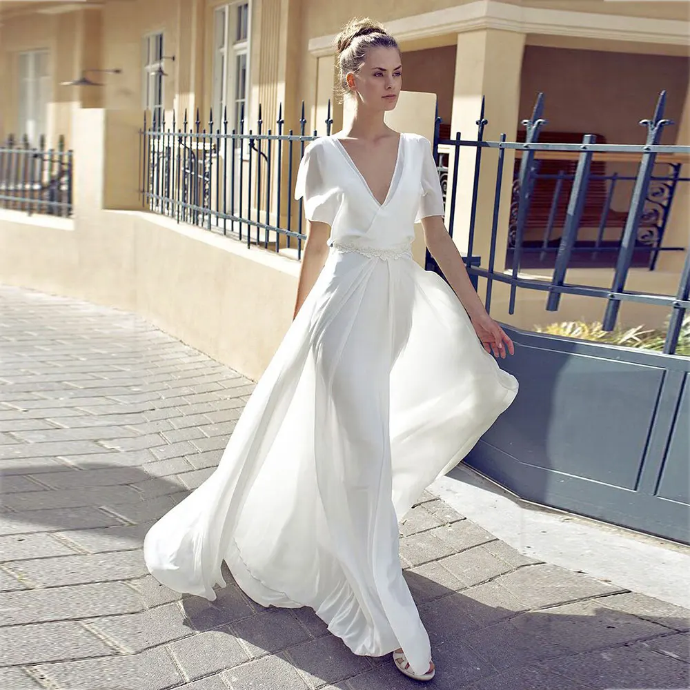 

2023 New Chiffon Wedding Dresses Beach V Neck Short Flare Sleeves Backless Appliqued Lace Bridal Gowns Vestido De Noiva