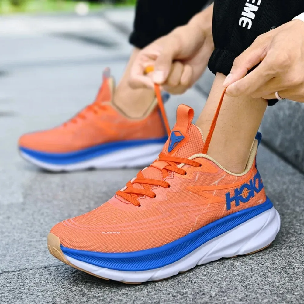 أحذية الجري الجديدة للرجال والنساء أحذية الجري القابلة للتنفس خفيفة الوزن أحذية المشي أحذية رياضية فاخرة للجيم