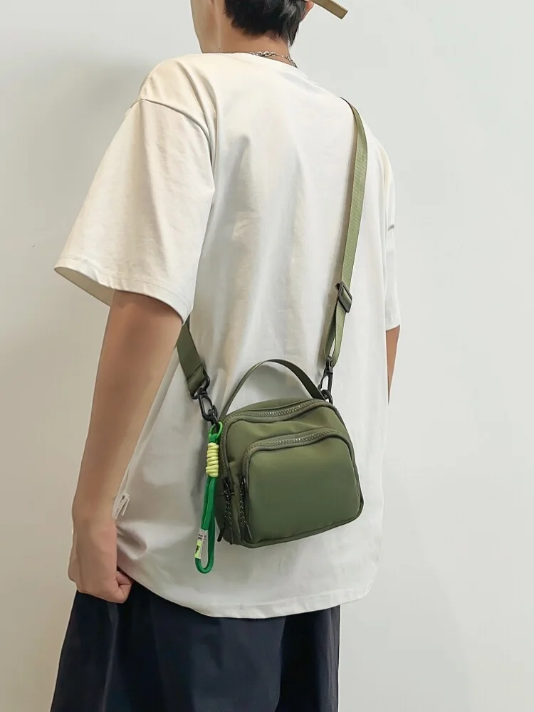 

Portable Small Leisure Sports Bag for Men Handheld Mobile Phone Bag Crossbody Bag Outdoors Casual Nylon Fabric Zipper Closure