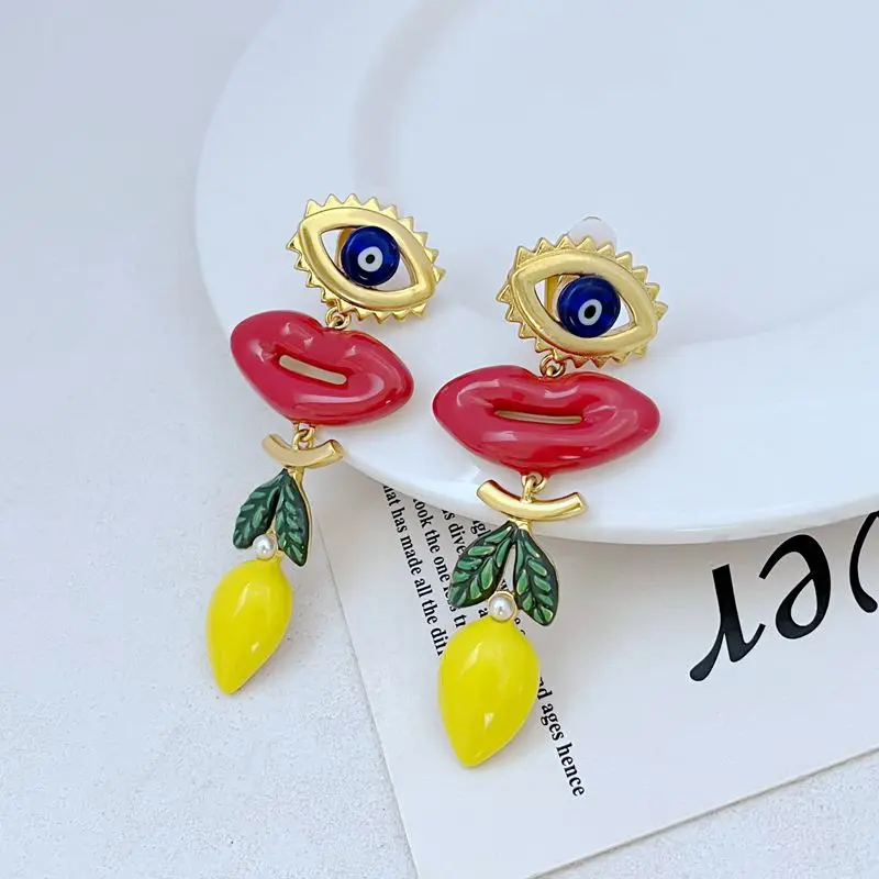 

Fashion Light Luxury Commuter Enamel Painted Eyes Big Red Lips Lemon Long Ear Clip Yellow Lemon Fruit Green Leaf Ear Pendant