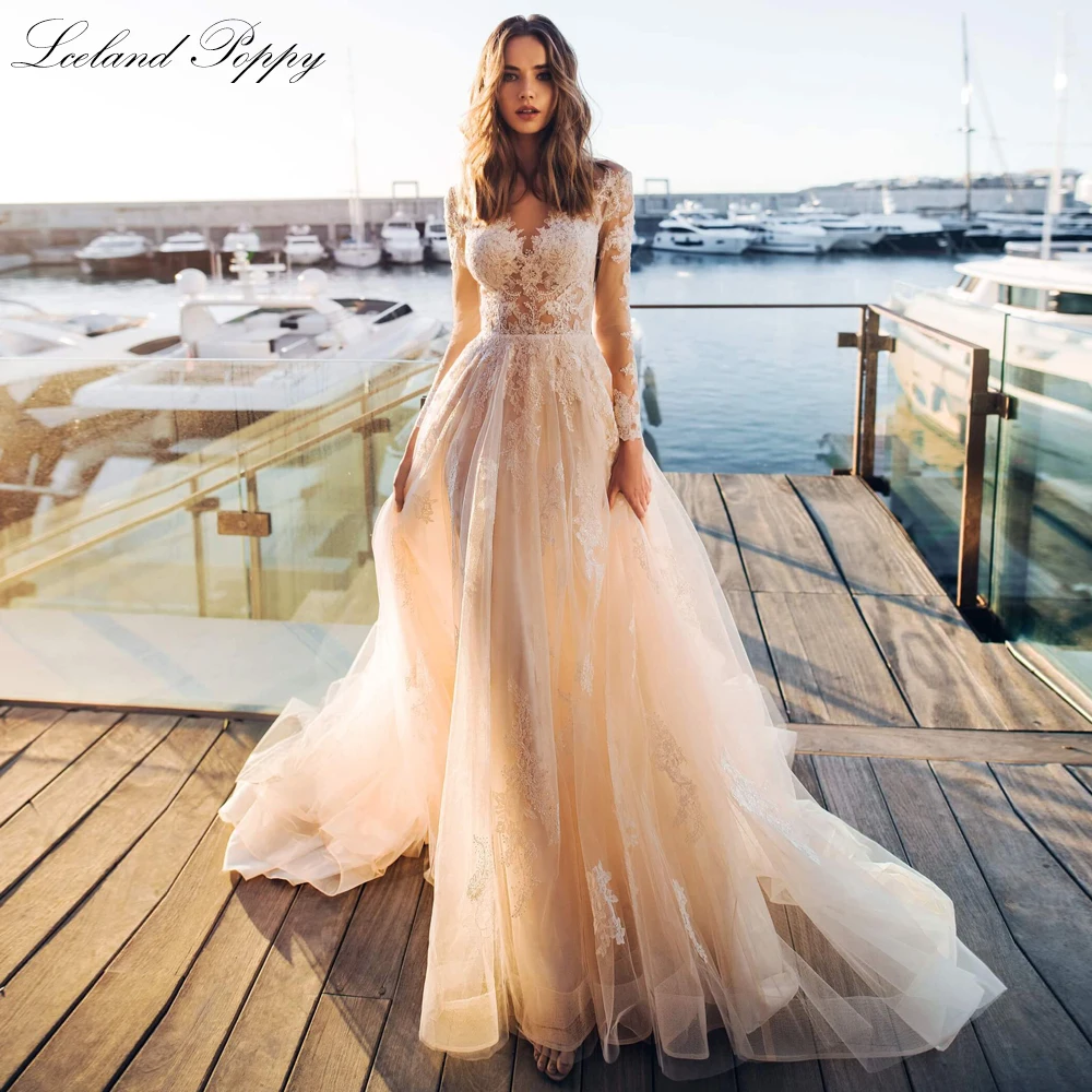 

Lceland Poppy A Line Scoop Neck See Through Wedding Dresses Long Sleeves Lace Floor Length Bridal Gowns with Chapel Train