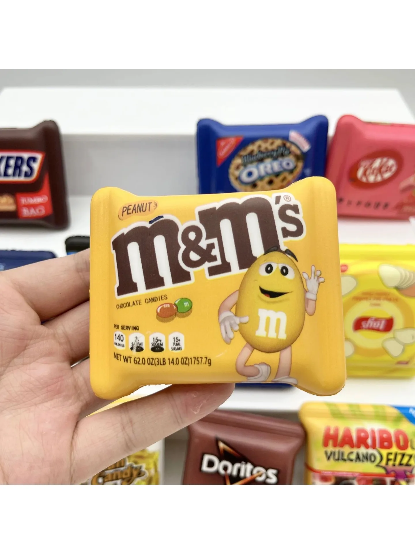 Heiß begehrter niedlicher Mini-Snack-Eimer, langsam zurückfedernder, knautschbarer Musikanhänger aus weichem Silikon, Stressabbau-Geschenk für Weihnachten.