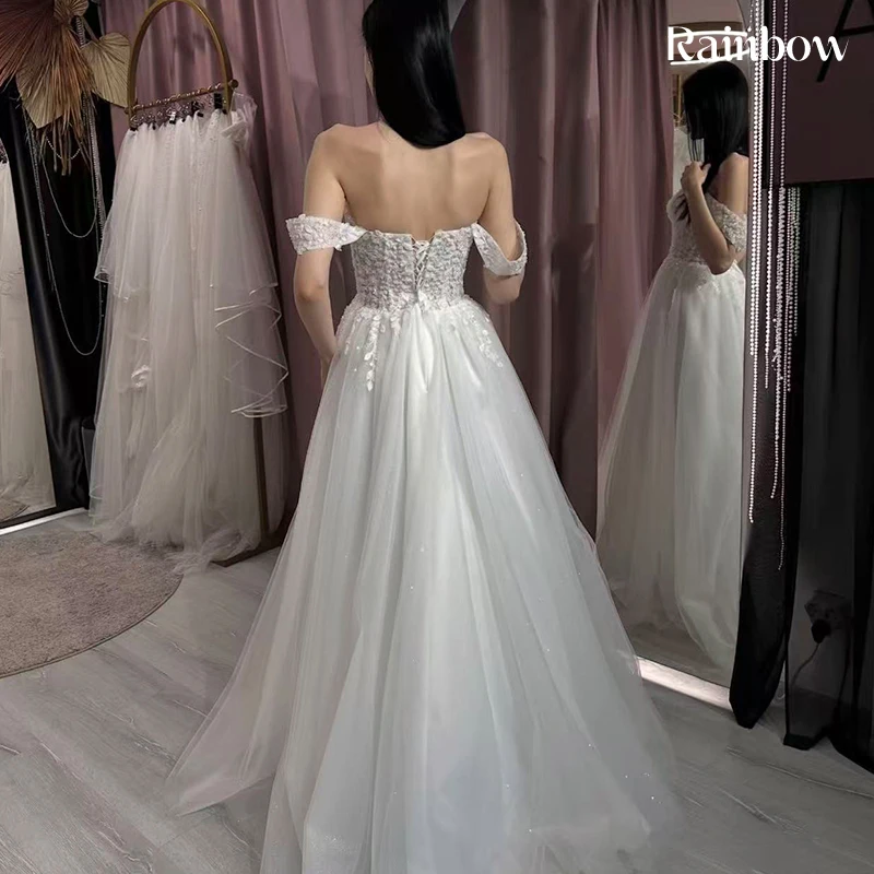 فستان زفاف مكشوف الكتفين من الأورجانزا مع تطريز على شكل حرف a بطول الأرض فستان زفاف مخصص برباط فيستدو دي نوفيا ترتر