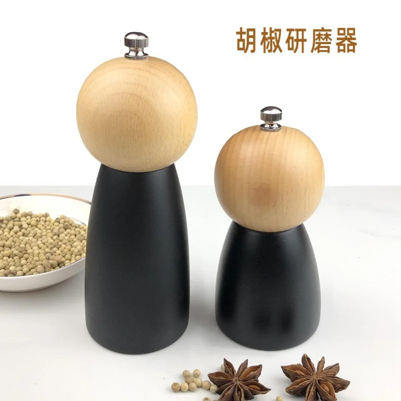 

New black round-head pepper grinder, manual pepper mill with ceramic core, kitchen tool