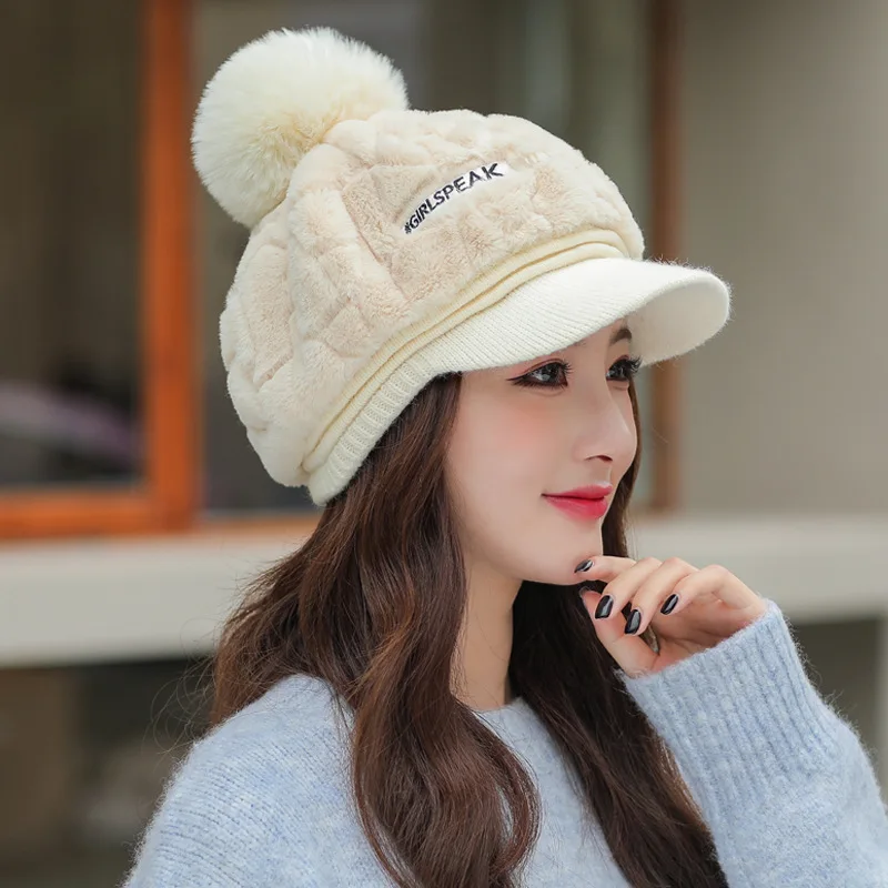 Autumn and winter new women\'s hats fashion wild plush warm duck tongue hat cute hairball cold protective ear cap