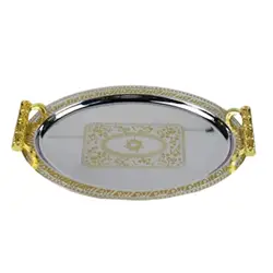 Decorative tray in stainless steel with handles for the living room in the