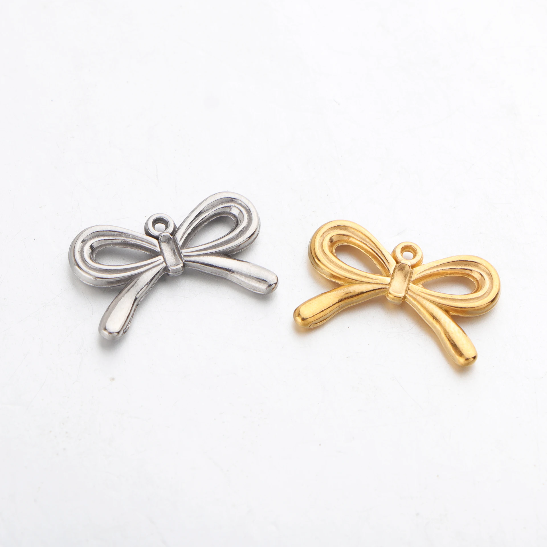 

20pcs/lot Stainless Steel Bow Charms Knotting Up Pendant for DIY Necklace Earring Bracelet Jewelry Making Accessories Wholesale