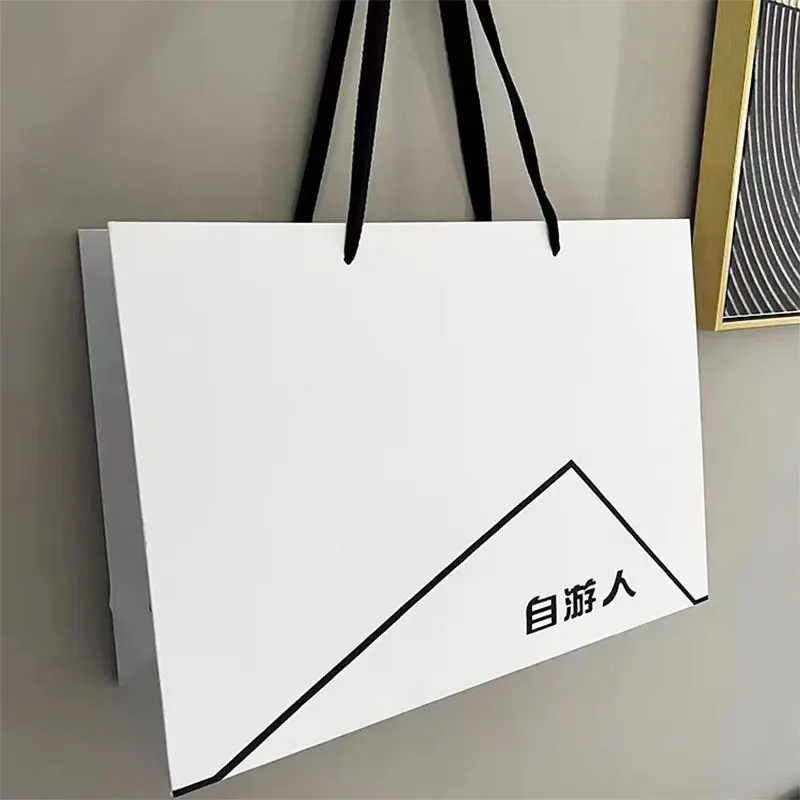 500pcs Customized Logo Brand Paper Bag With Bow Tie White Bags Christmas Day Gifts Bags Shopping Clothes Wig Jewelry Packages