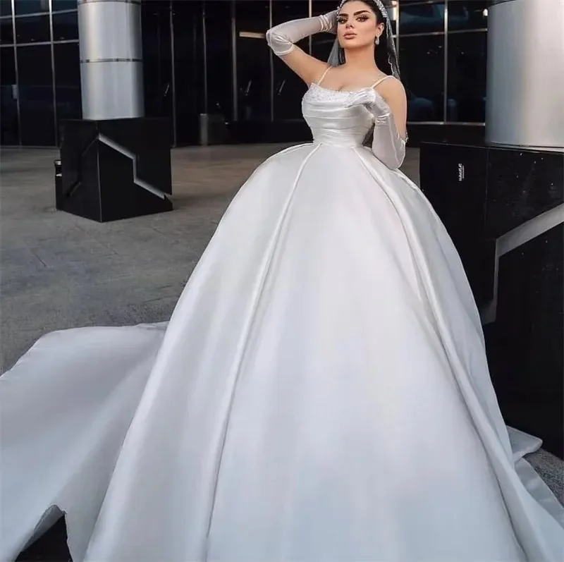 Suknie ślubne na zamówienie 2026, luksusowe, seksowne, nowoczesne, bez ramiączek, w kształcie litery A, na ramiączkach spaghetti, z trenem typu sweep, suknie ślubne księżniczki.