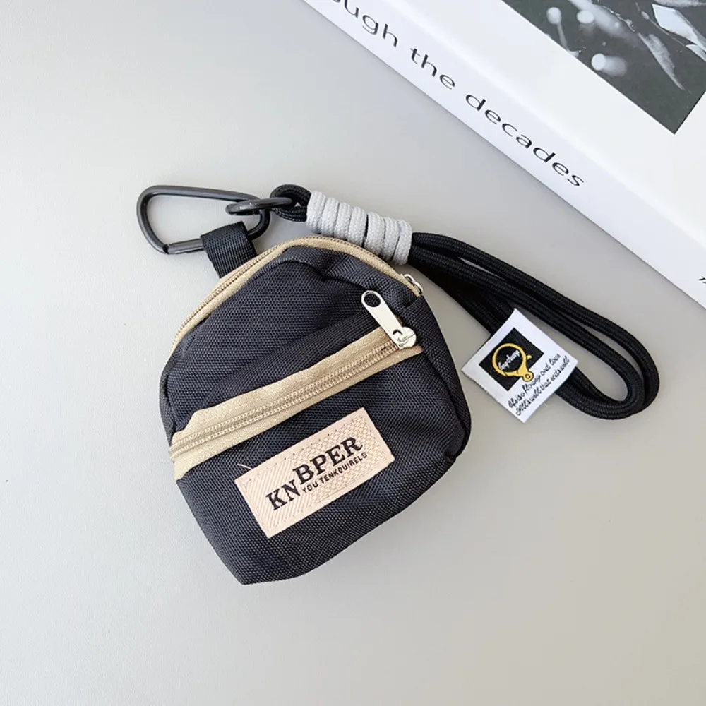 Portable Hanging Coin Purse Contrasting Color Anti-theft Earphone Storage Bag Short Wrist Strap Pendant Mini Wallet Girl