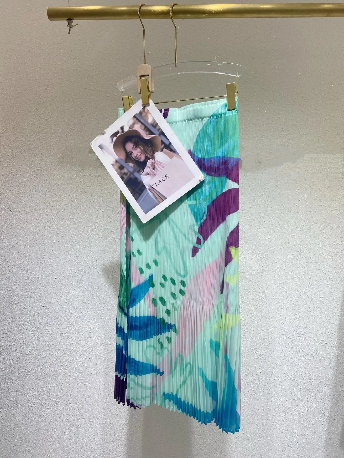 Mezza gonna stampata a pieghe Miyake 2025 Estate Nuova gonna a trapezio con sensazione premium Mezza gonna casual stile piccola fragranza