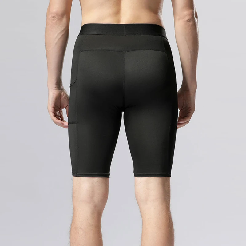 Leggings sportivi da uomo Pantaloni fitness maschili Collant a compressione elastica Pantaloncini da allenamento per corsa da palestra Pantaloncini con fondo ad asciugatura rapida