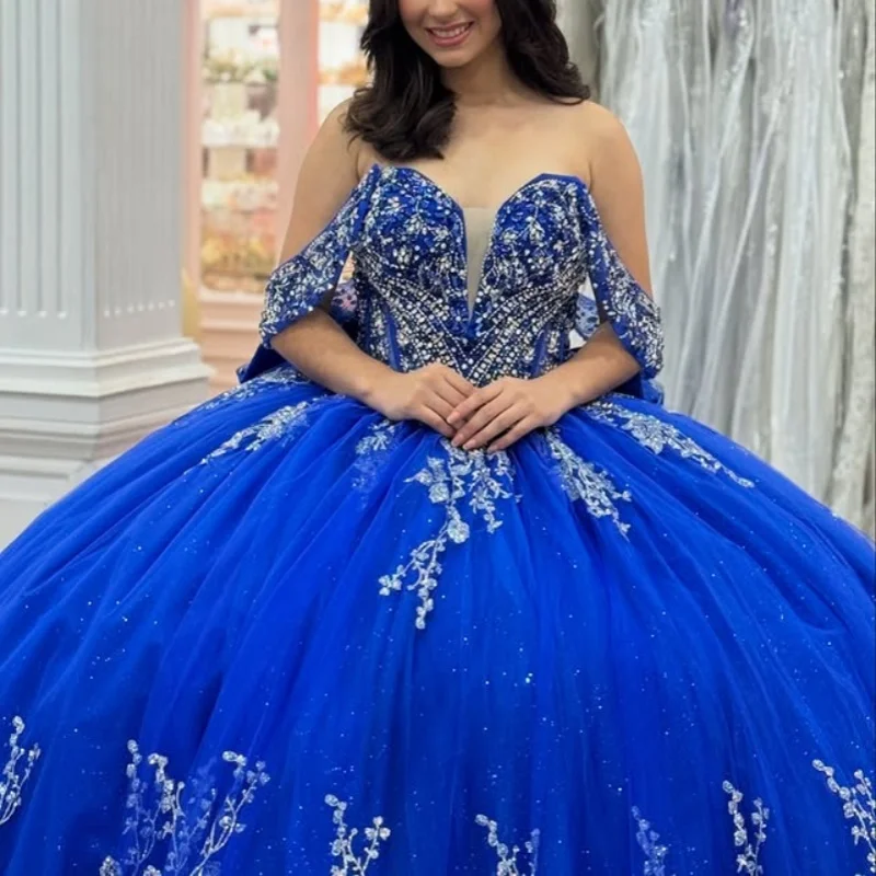 

Блестящие синие платья Quinceanera по индивидуальному заказу с открытыми плечами и аппликацией из блесток и кристаллами с длинным хвостом и бантом Vestido 15, Quinceanera