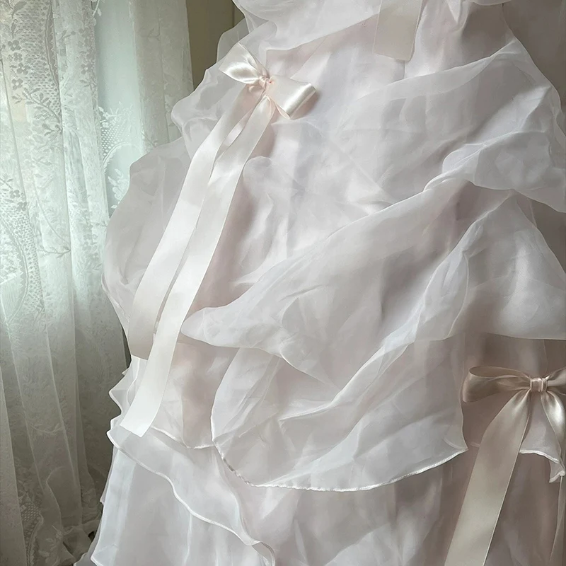 AnXin SH เจ้าหญิงดอกไม้สีชมพูลูกไม้เกาะอกแขนกุดประดับด้วยลูกปัดมุกโบว์รัฟเฟิลบอลชุดผูกเชือกชุดแต่งงานที่กำหนดเอง