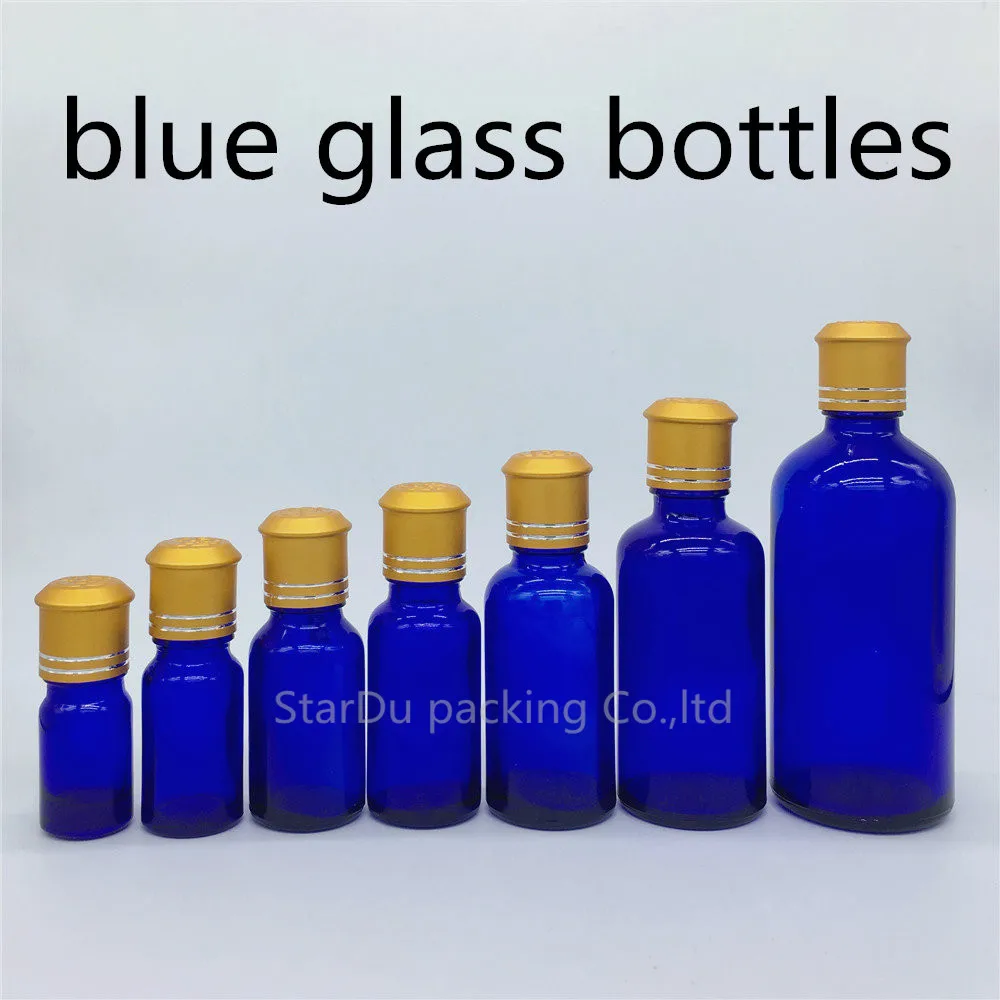 

5ml 10ml 15ml 20ml 30ML 50ml 100ml Blue Glass Bottle, Blue Vials Essential Oil Bottle With Decorative Pattern Cap 480pcs/lot