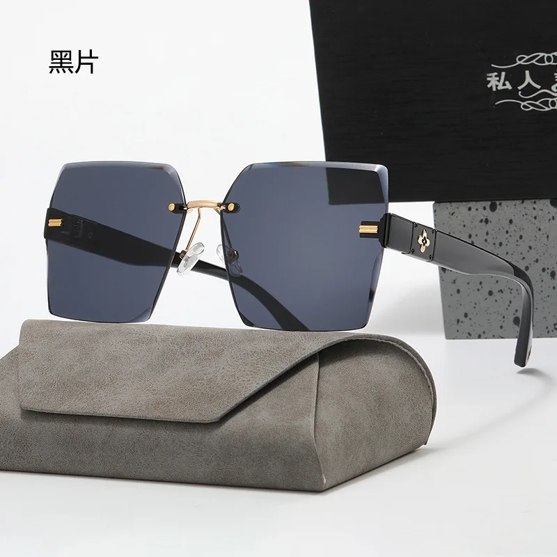 ​​Womens Frameless Large Frame Gradient UV Protection Sunglasses Fashion Trendy Iridescent Versatile​​