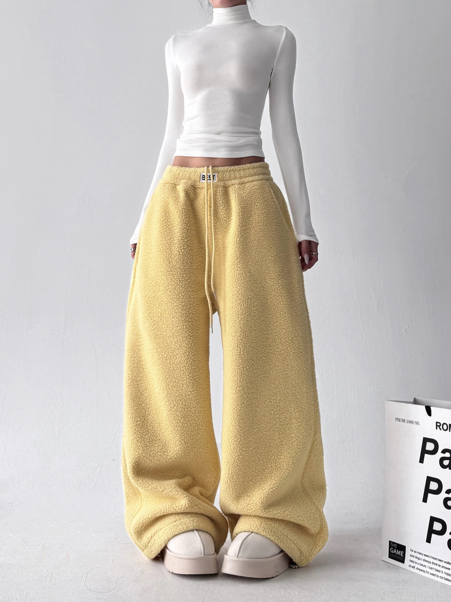 Pantalones de pierna ancha amarillo Fce para mujer Otoño Invierno Ultra ular nuevos pantalones de algodón forrados Sle Fce pantalones casuales sueltos y cálidos