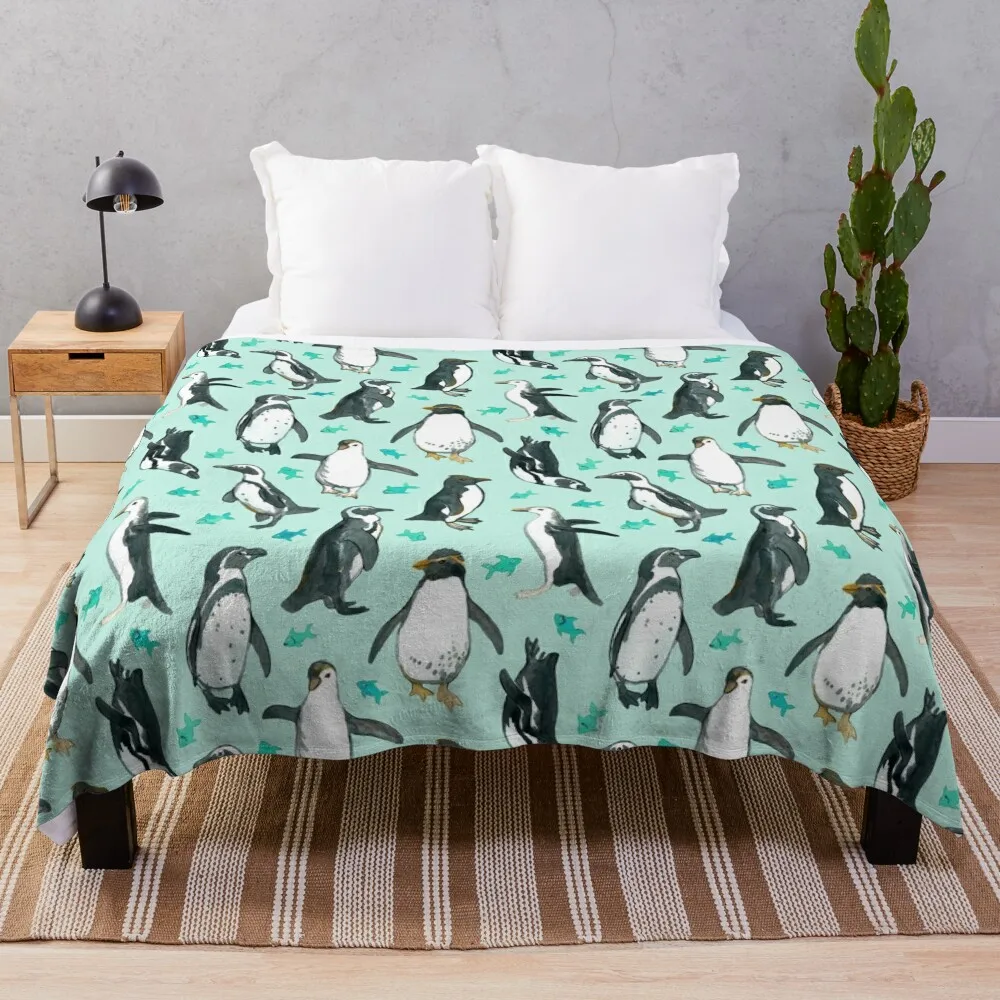 

Lots of Little Penguins on mint Throw Blanket Stuffed Blankets