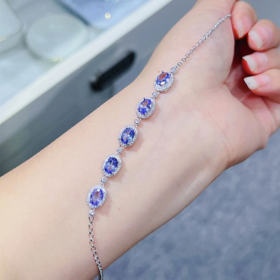 

Natural Tanzanite Bracelet, Vivid Purple Eye-Clean Gemstone Dazzling Fire 5x7mm Oval Cut, 925 Silver Precision Setting Jewelry