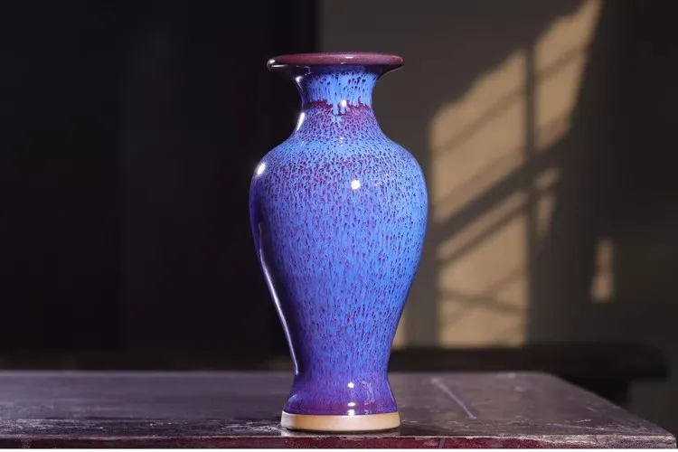Jun porcelain fish tail bottle with floral glaze, collection decoration.