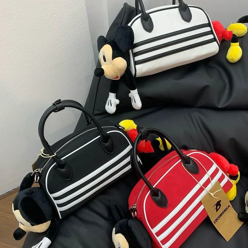 2024 New Cartoon Mickey Mouse Handbag Cute Cartoon Fashion Dopamine Sports 3D Anime peluche Doll Bowling Handbag Toys regali per ragazze