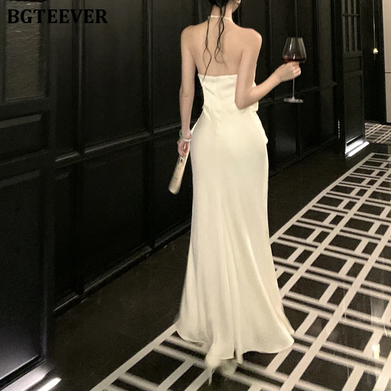 BGTEEVER エレガントなホルターパールノースリーブパッケージヒップサテンドレス女性のための春夏ファッションスリムウエストレディーススキニードレス