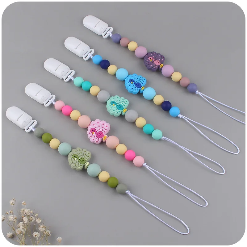 ABCPICK New Baby Products Cartoon Animal Peacock Toothpaste Soothing Baby Silicone Beads Bite Teeth Grinding Nipple Chain