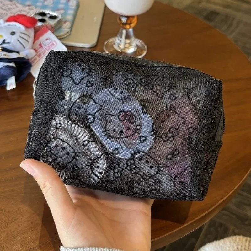 Neue Sanrio Hello Kitty Mesh-Material Kosmetik Aufbewahrungstasche Kreative tragbare Handtasche mit hoher Kapazität und Reißverschluss Niedliches Mädchenzubehör