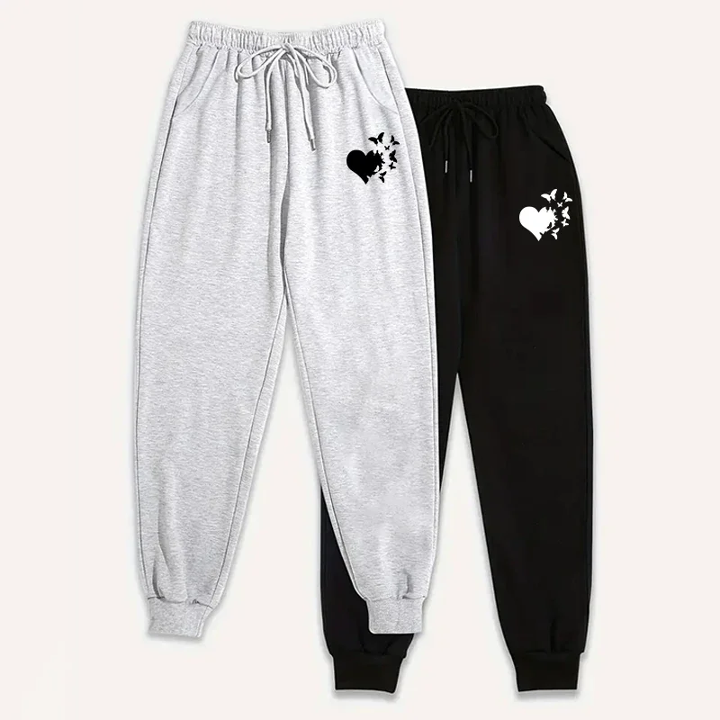 ชุดเซ็ต 2 ชิ้น กางเกงจ็อกเกอร์ผู้หญิง ปี 2025 แพ็ค 2 ตัว กางเกงสเวตแพนท์สีพื้นลำลอง กางเกงเลานจ์ใส่สบายสำหรับฤดูใบไม้ร่วงและฤดูหนาว กางเกงออกกำลังกายกลางแจ้งทรงสปอร์ต