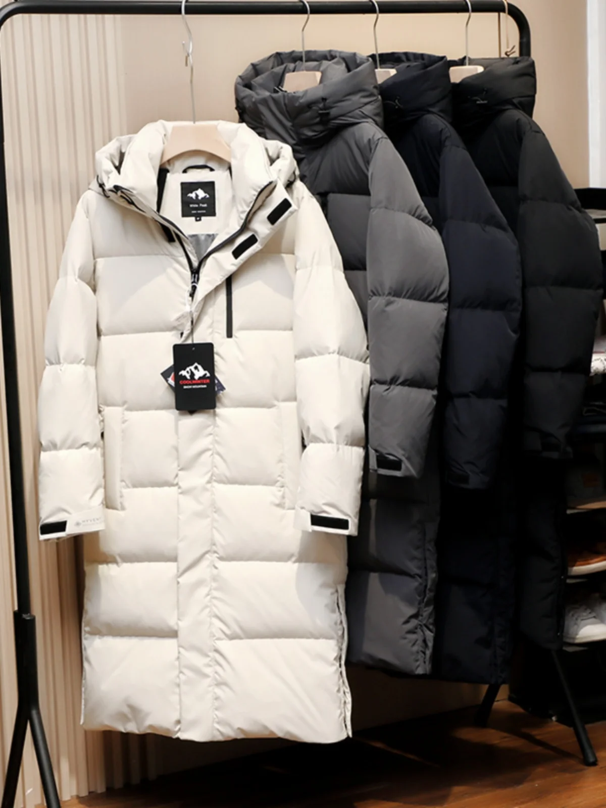 

Тяжелое длинное пальто выше колена 90 на гусином пуху с капюшоном Jaet 800 Fill Power Thiened для мужчин и женщин, пары на открытом воздухе...