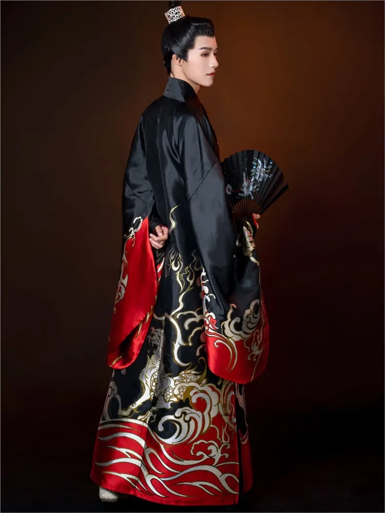 

The Hanfu men's Taoist robe style with a woven gold cape and cross-collar features Chinese that is not ancient costume