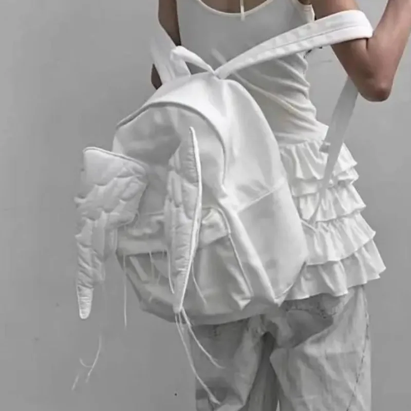 Mochilas con borlas de alas de Ángel para Mujer, Mochila personalizada de gran capacidad, Mochila fresca y novedosa, nuevos Bolsos originales para Mujer