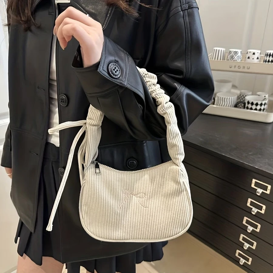 A Corduroy Women's Elegant Shoulder Bag. Bowknot Embroidery Accessories - Adjustable Shoulder Strap - Zipper Closure - Polyester Lining - Can Be Worn on One Shoulder - Can Be Carried by Hand - Cute and Compact Underarm Bag for Women - Suitable for Various Occasions - Women's Shoulder Bag Suitable for Teenagers