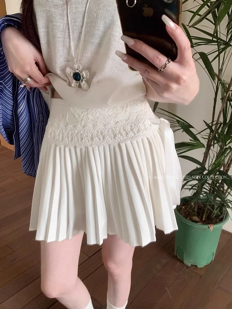 تنورة Balletcore على الطراز الفرنسي، بيضاء صغيرة مع تنورة دانتيل برباط، مجموعة جديدة 2025 تنورة قصيرة بيضاء حلوة على شكل حرف A