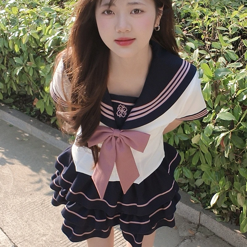 JK زي مدرسي البحرية طوق قصيرة الأكمام مطوي تنورة مجموعة الرغبة النقية اللون حجب الحلو لينة فتاة كلية نفخة الأكمام