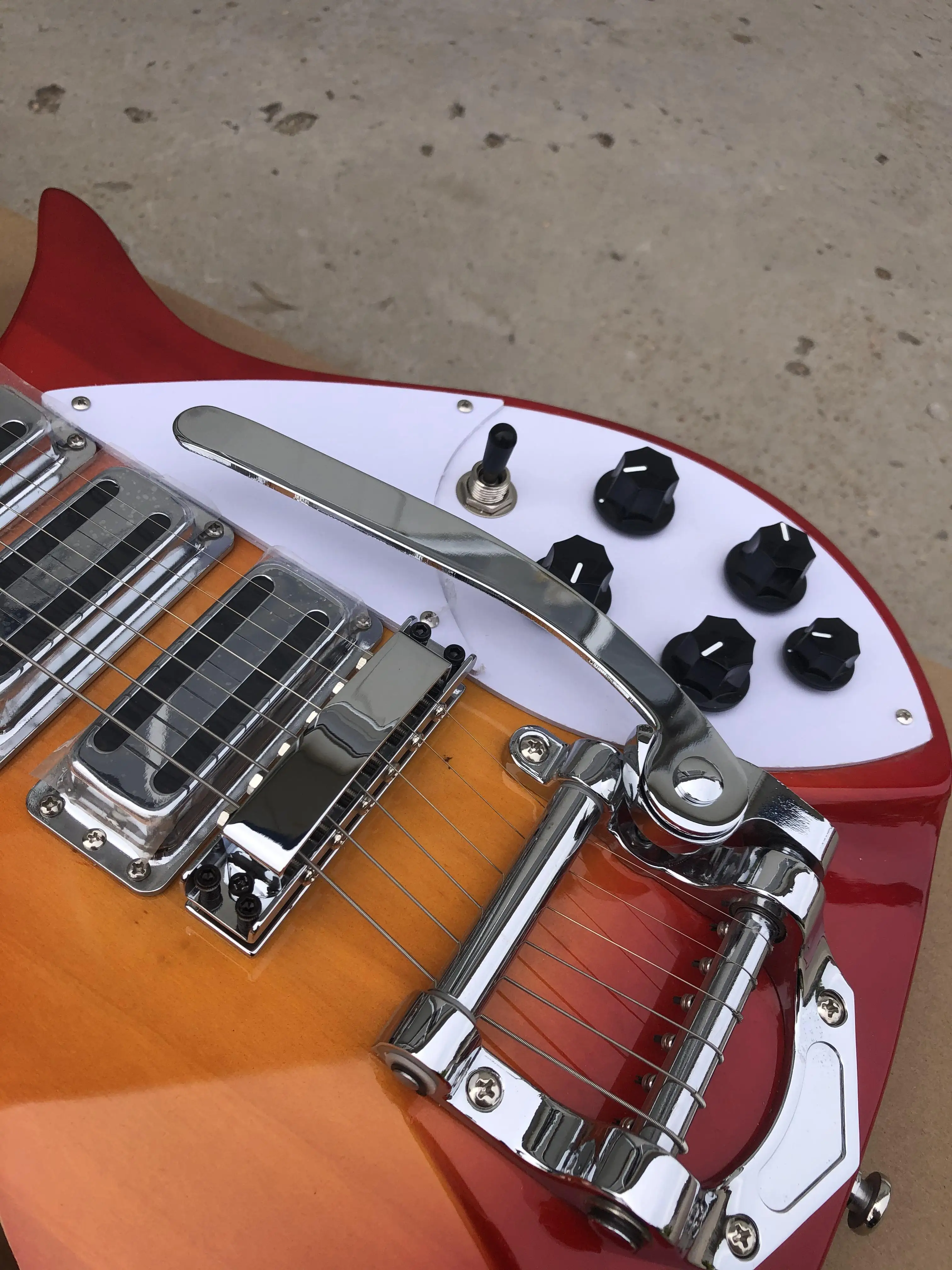 Electric Guitar with Rickenbackerf Hole, Cherry Sunburst Color, RosewoodFretboard, Tremolo System, Semi-Hollow Body Instrument,