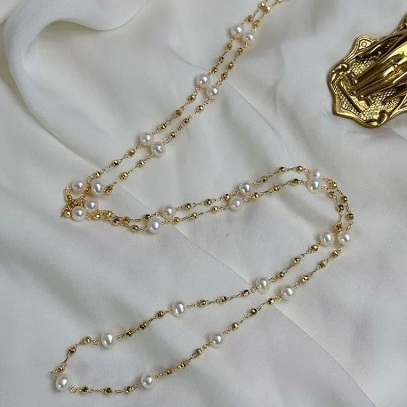 

Gypsophila Sweater Chain 6-7mm Near Round Strong Luster Slightly Flawed Natural High-Quality Freshwater Pearl 14k Gold Filled