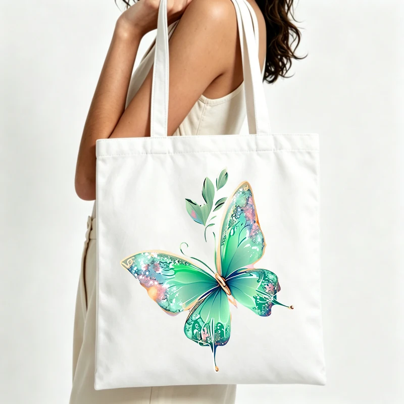 butterfly graphic canvas tote bag with artistic print, ideal for daily shopping and casual outings