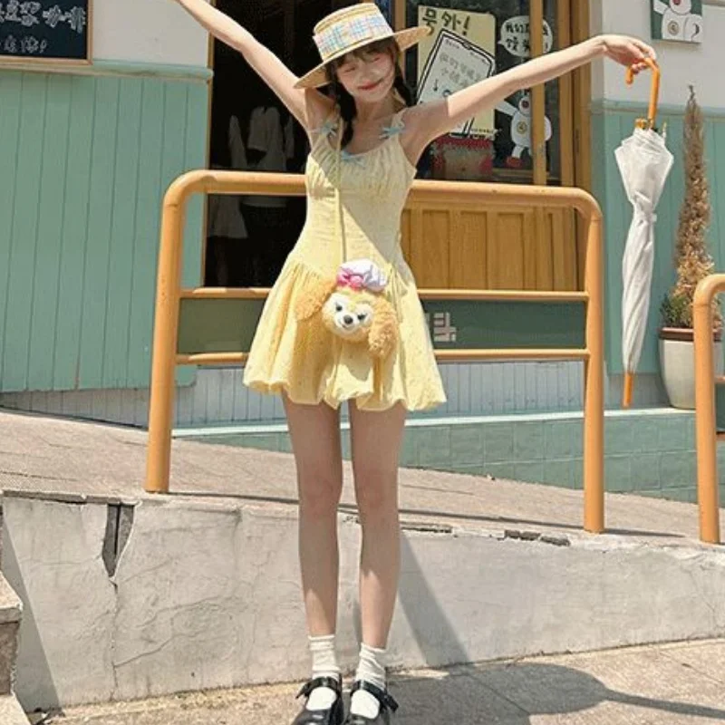 Damen Sommer-Minikleid Gelb mit Polka Dots und Schmetterlingsknoten, Bubbel-Saum-Kleid, Niedliches Urlaubskleid für Frauen