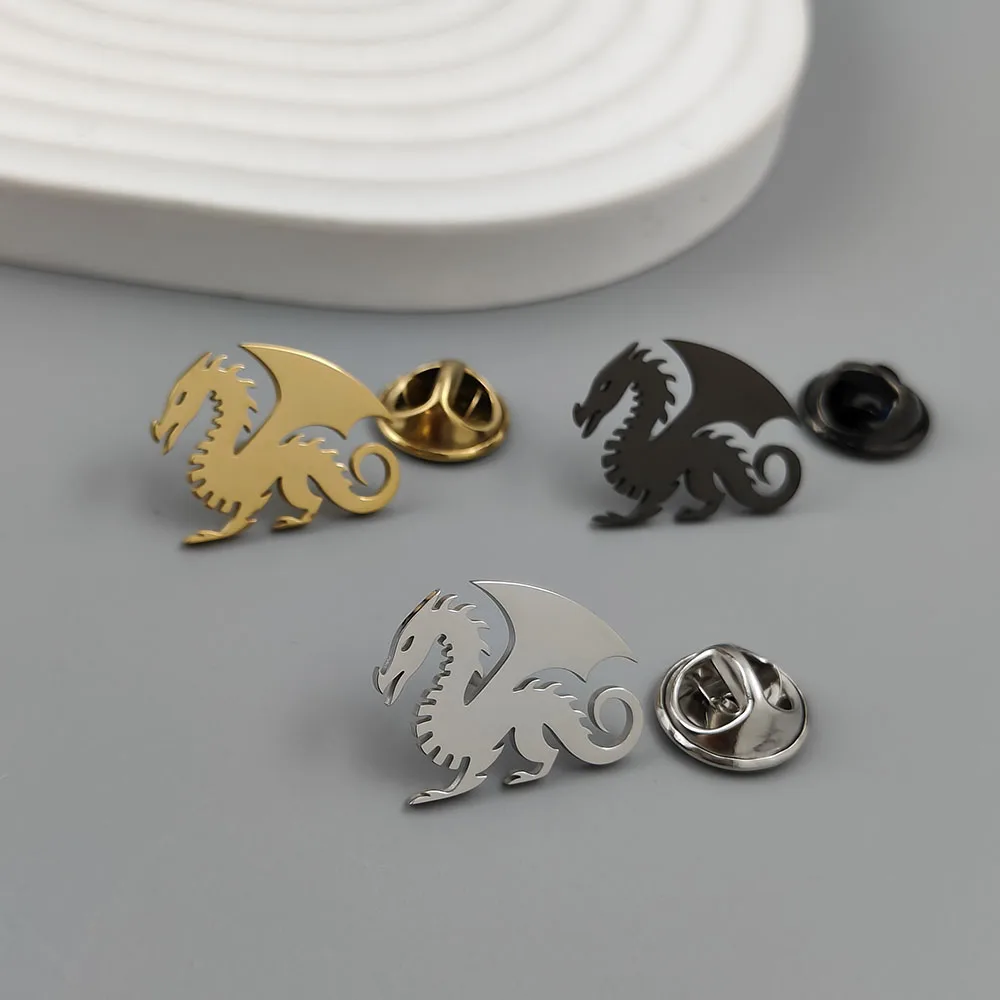 

Metal dragon brooch. Unusual flying dragon steel brooch, versatile badge or emblem, an exquisite and compact gift