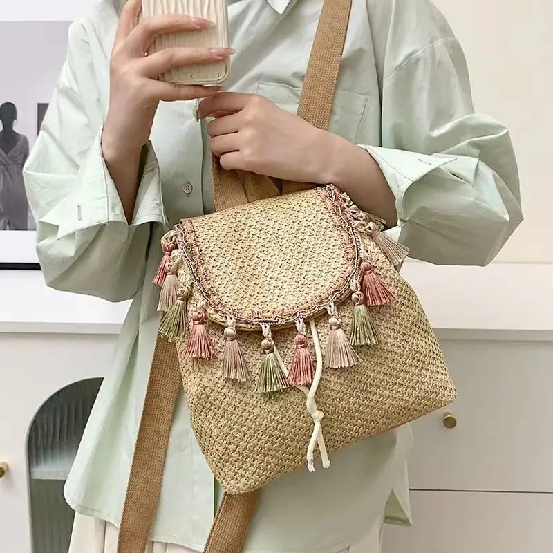 2023 New Seaside Summer Tassel Travel Vacation Woven Backpack Fashion Simple Art Handwoven Hollow Grass Woven Bag For Womem