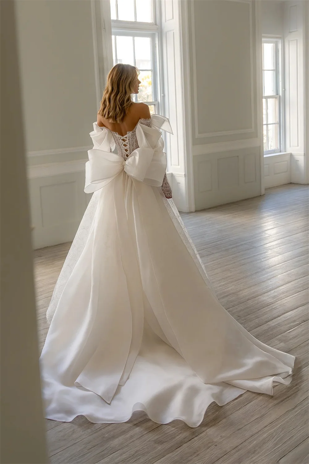 فستان زفاف كيوتو مخصص باللون الأبيض قبالة الكتف من الدانتيل مع فيونكة وأكمام طويلة على شكل حرف a ذيل محكمة للسهرات الرسمية #2
