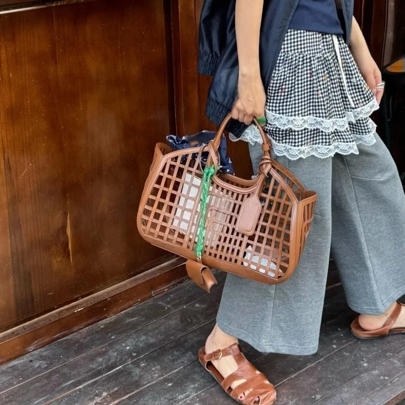

2025 new ladies hollow genuine leather handbag fashion Joker shoulder crossbody bags real leather woven bag luxury women's bag