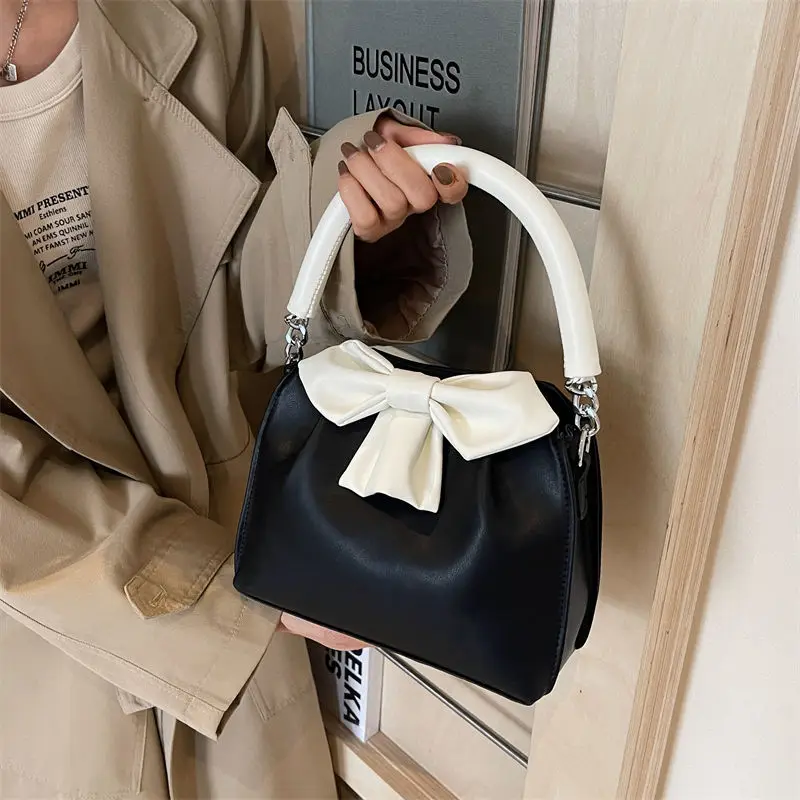

2025 New Cute Black White Striped Bow Handbag Fashion Elegant Commuter Tote Bag Women's Multi-functional Shoulder Cross-body Bag