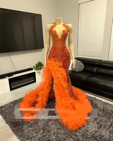 Orange Balklänningar 2024 Lyxig Svart Flicka Sjöjungfru Pärlstav Kristall Volanger med Slits Födelsedagskvällen Galaklänning Examensklänning 10 best sales orange balklänningar - №2
