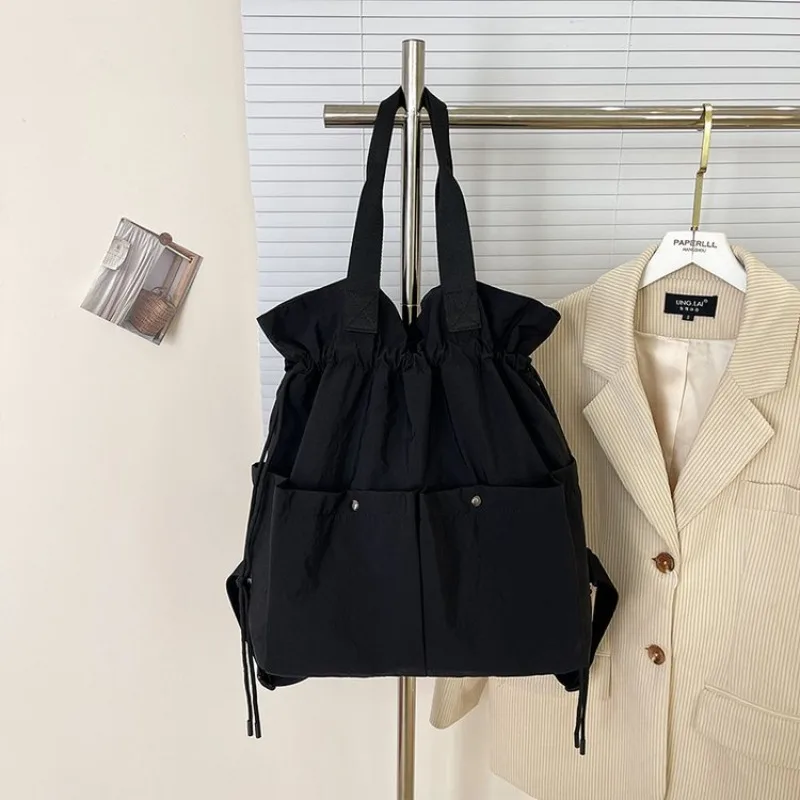 

Ретро-сумка для подгузников для женщин, дизайнерская сумка через плечо, люксовый бренд, минималистичный шик, вместительная кожаная сумка-тоут