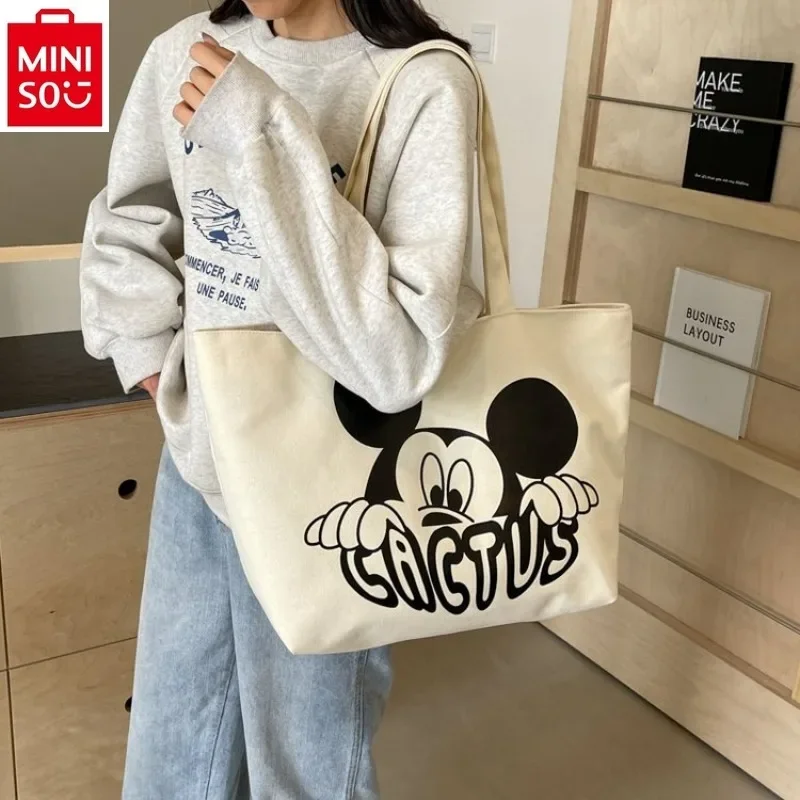 

MINISO Disney high-quality canvas carrying crossbody bag for women, cute cartoon Mickey, large capacity storage tote bag