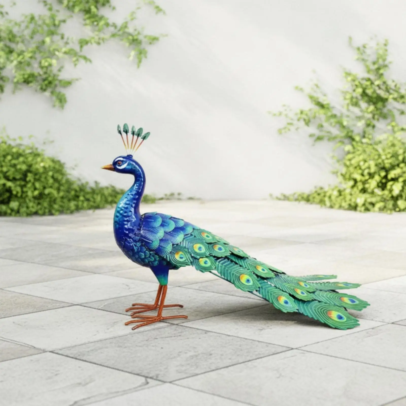 Metal garden statue depicting a peacock, decorative sculpture for