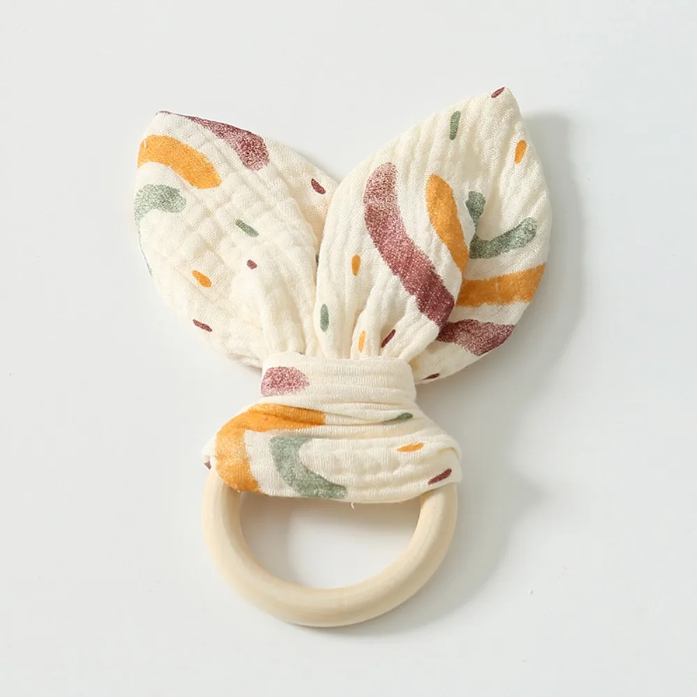 

Soft Baby Wooden Hand Grasp Natural Wooden Sensory Newborn Teething Ring Rabbit Ears Bracelet Rattle Chewing Appease Infant